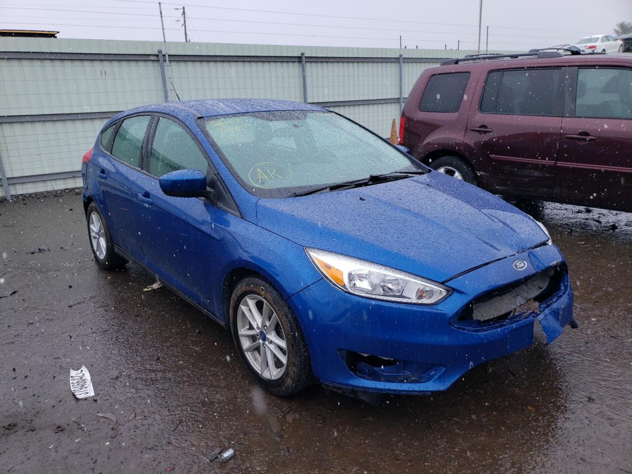 FORD FOCUS SE 2018 with VIN 1FADP3K25JL224951 - Photo from auction