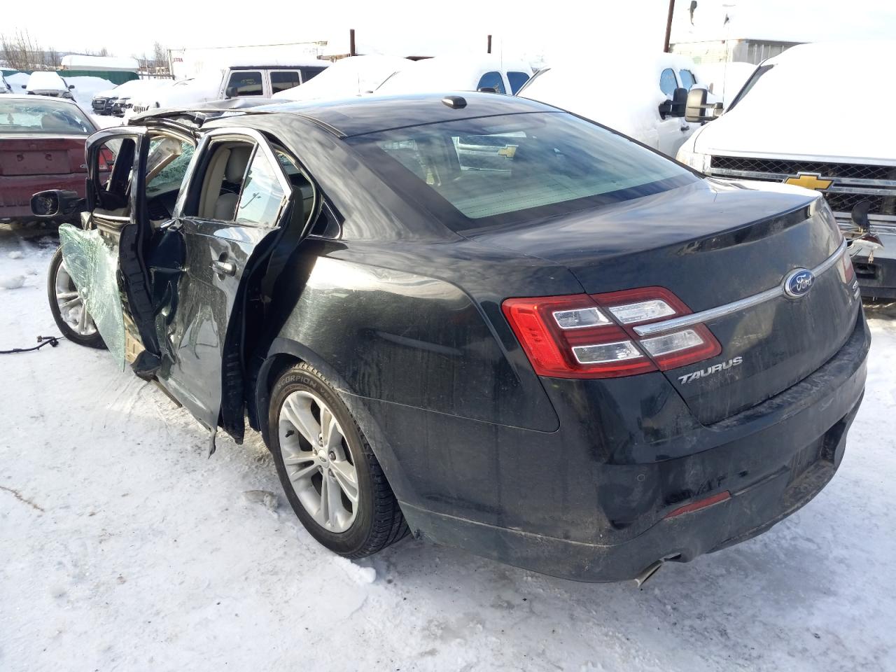 Photo 3 from auction – 2013 FORD TAURUS SEL with VIN 1FAHP2H8XDG117611