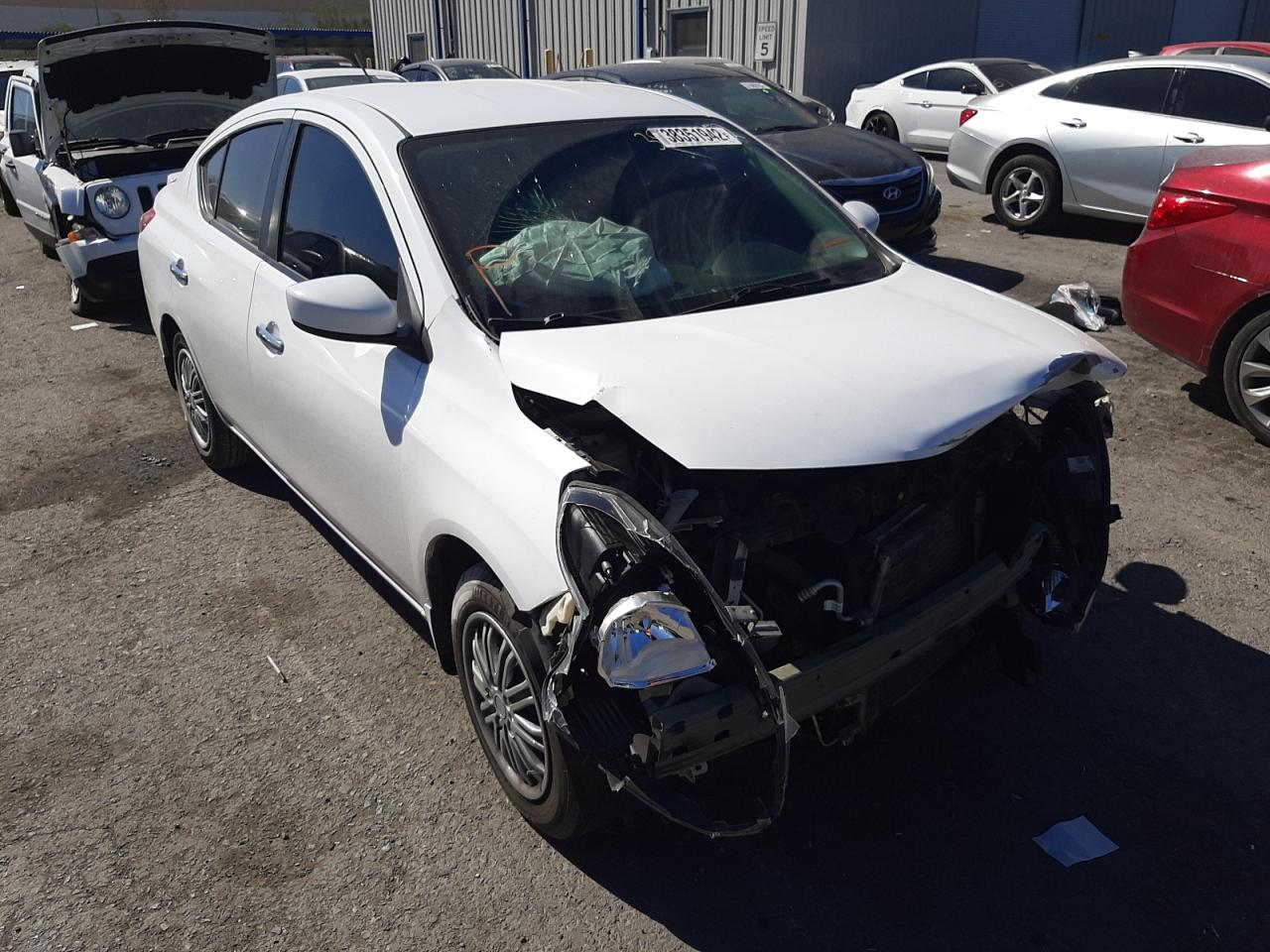 NISSAN VERSA S 2015 with VIN 3N1CN7AP1FL910404 - Photo from auction