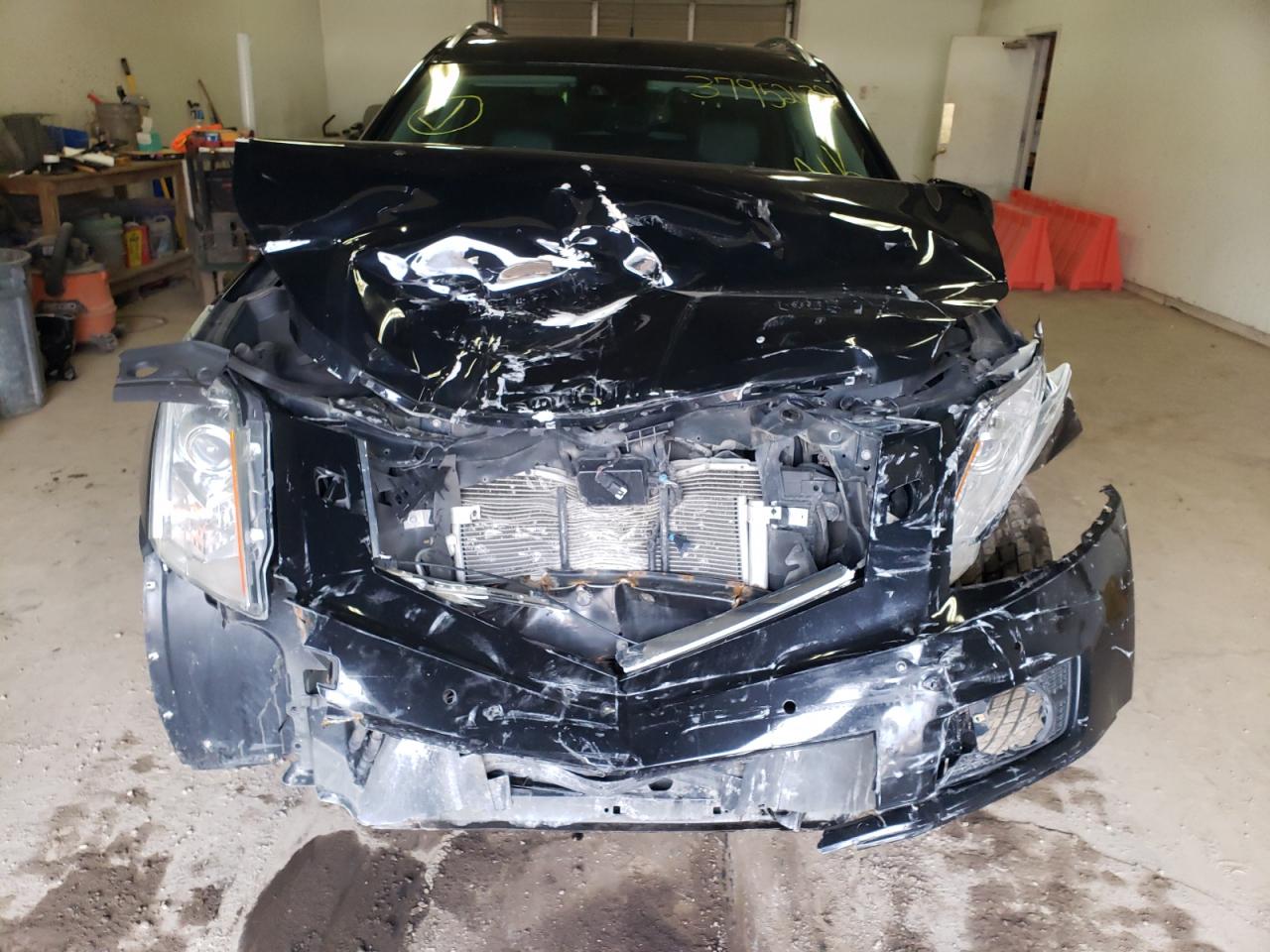 Photo 9 from auction – 2014 CADILLAC SRX PREMIU with VIN 3GYFNGE31ES549093