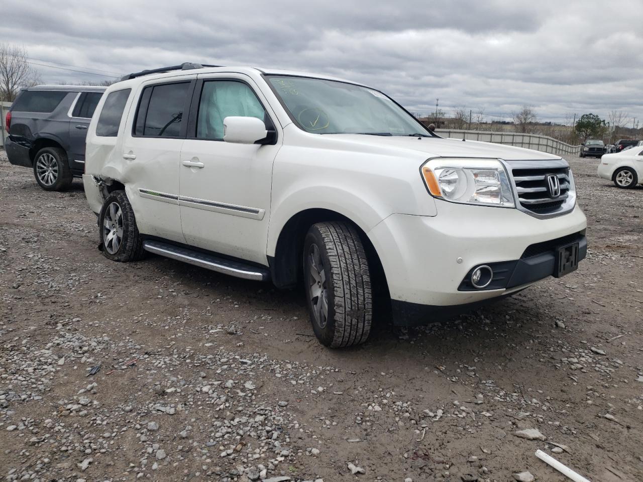HONDA PILOT TOUR 2014 with VIN 5FNYF4H92EB021288 - Photo from auction