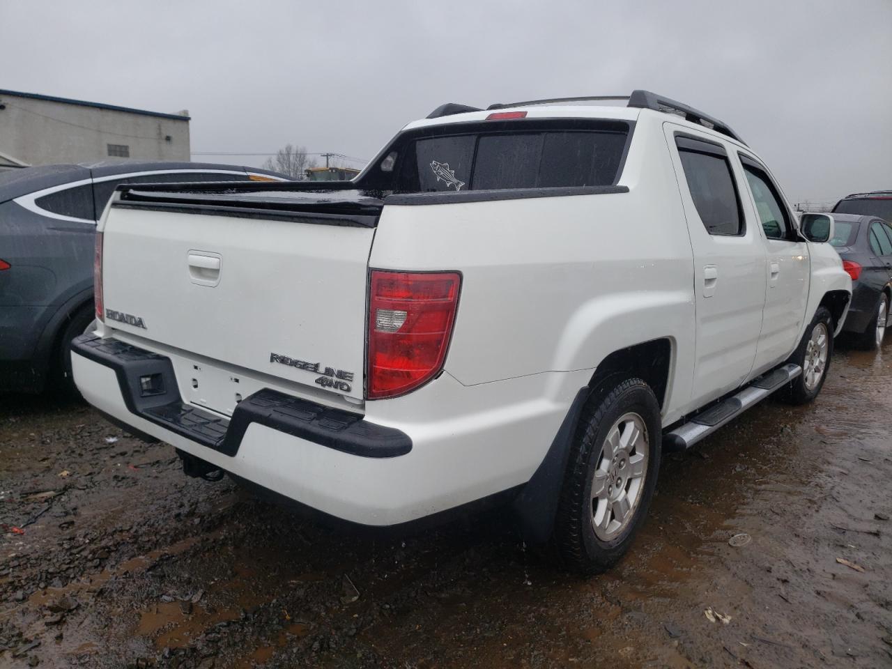 Photo 4 from auction – 2011 HONDA RIDGELINE with VIN 5FPYK1F45BB001850