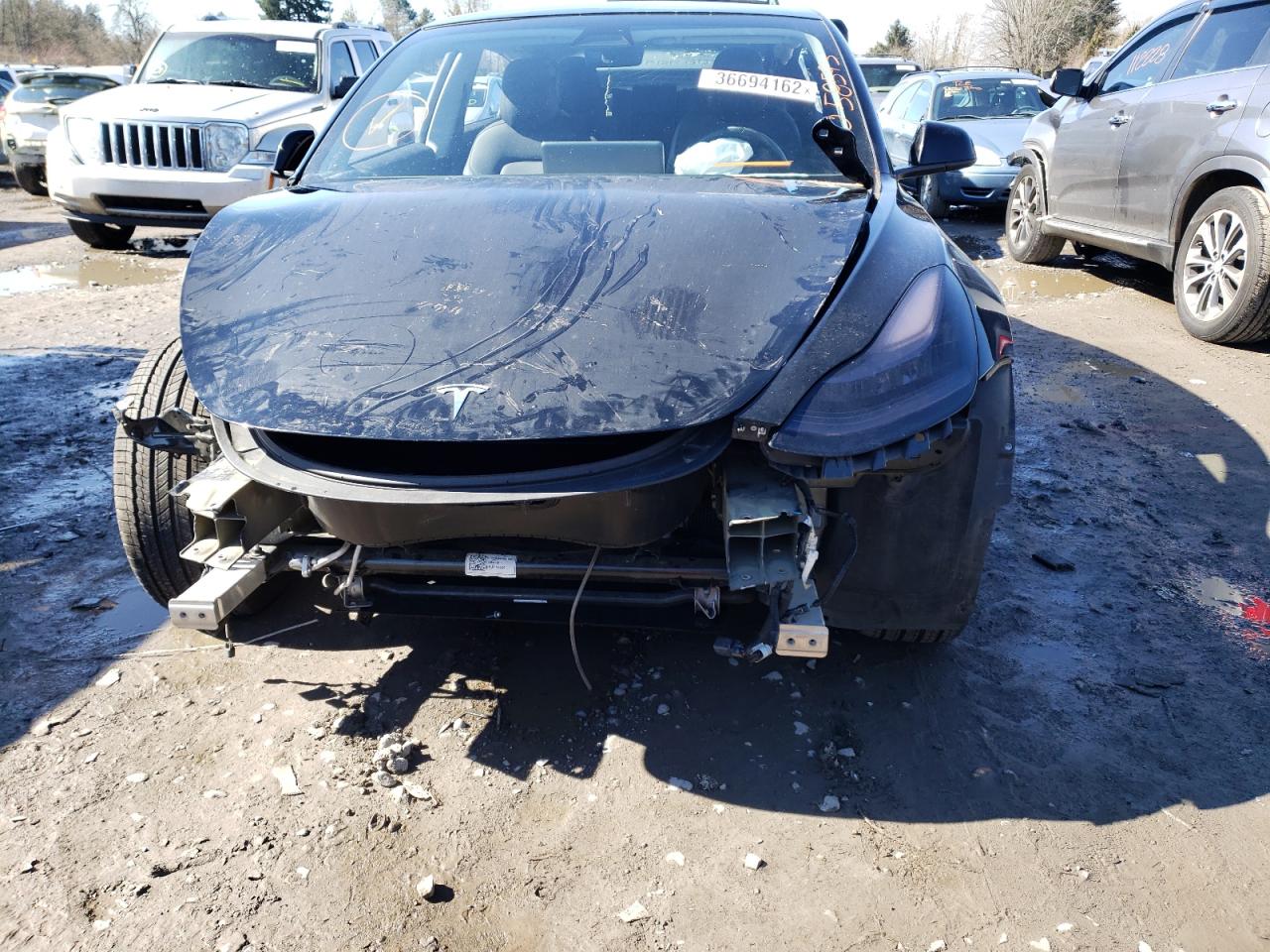 Photo 9 from auction – 2018 TESLA MODEL 3 with VIN 5YJ3E1EA7JF056655