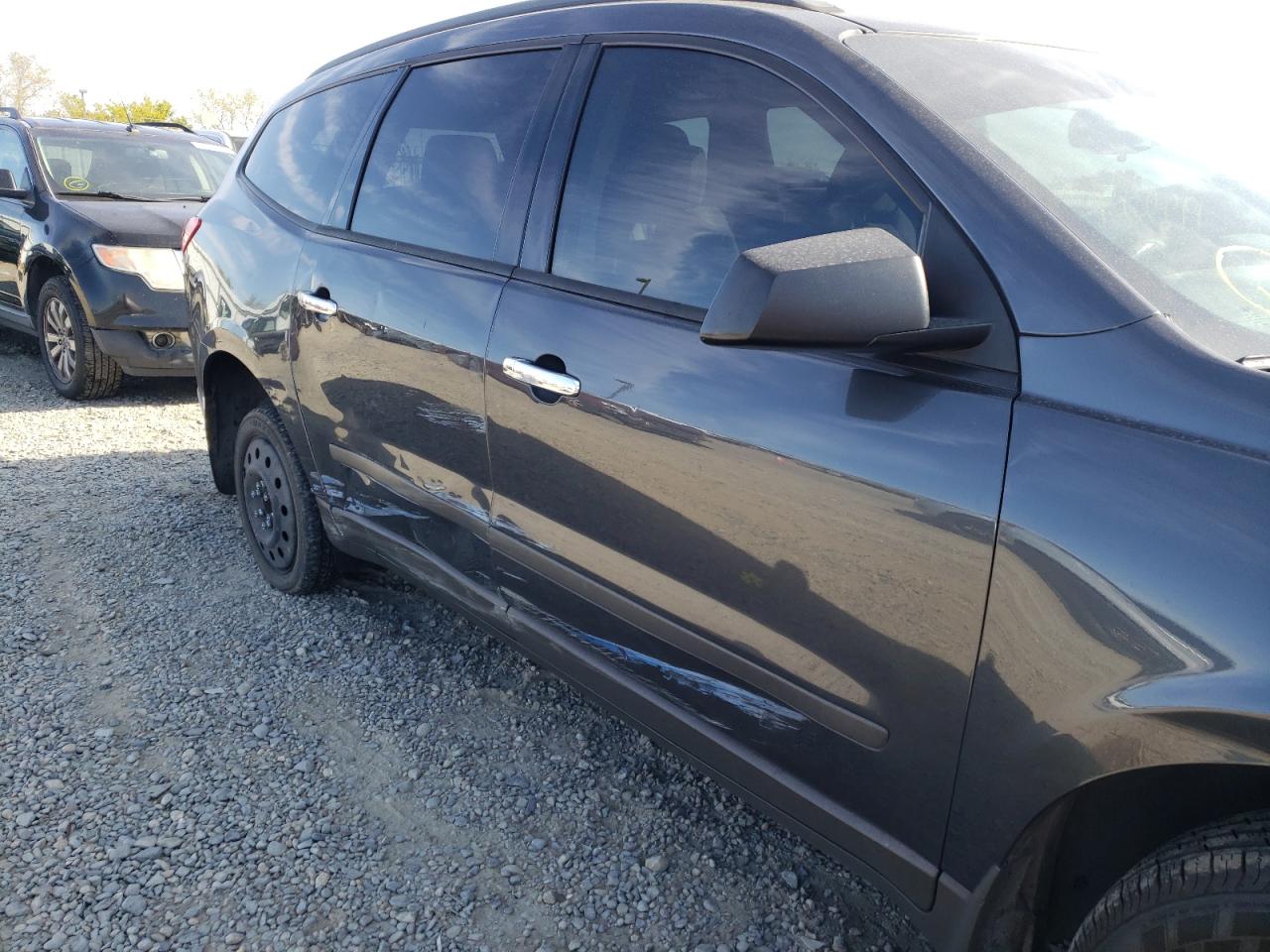 Photo 9 from auction – 2012 CHEVROLET TRAVERSE L with VIN 1GNKRFED0CJ286595
