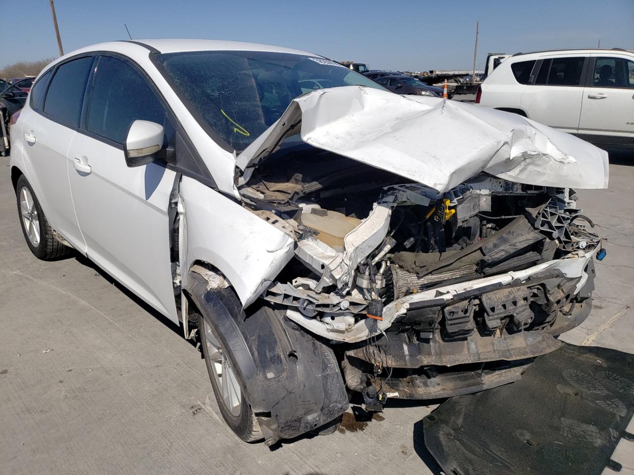 FORD FOCUS SE 2015 with VIN 1FADP3K25FL315385 - Photo from auction
