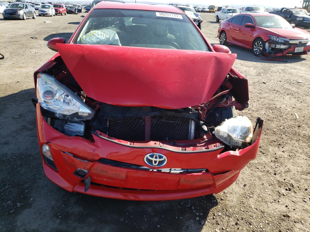 Photo 9 from auction – 2014 TOYOTA PRIUS C with VIN JTDKDTB37E1063362