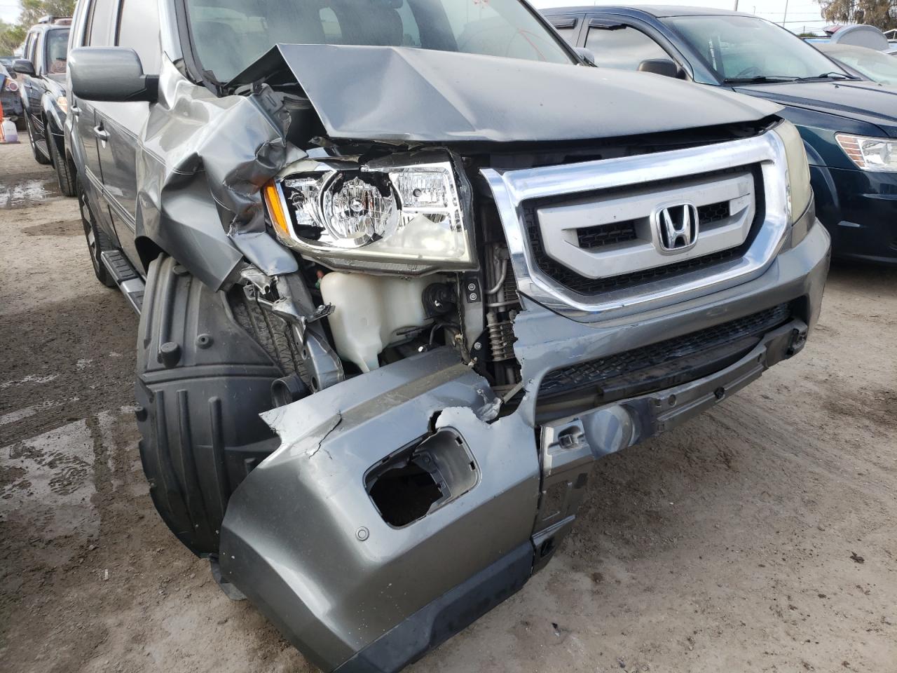 Photo 9 from auction – 2009 HONDA PILOT with VIN 5FNYF38989B005628