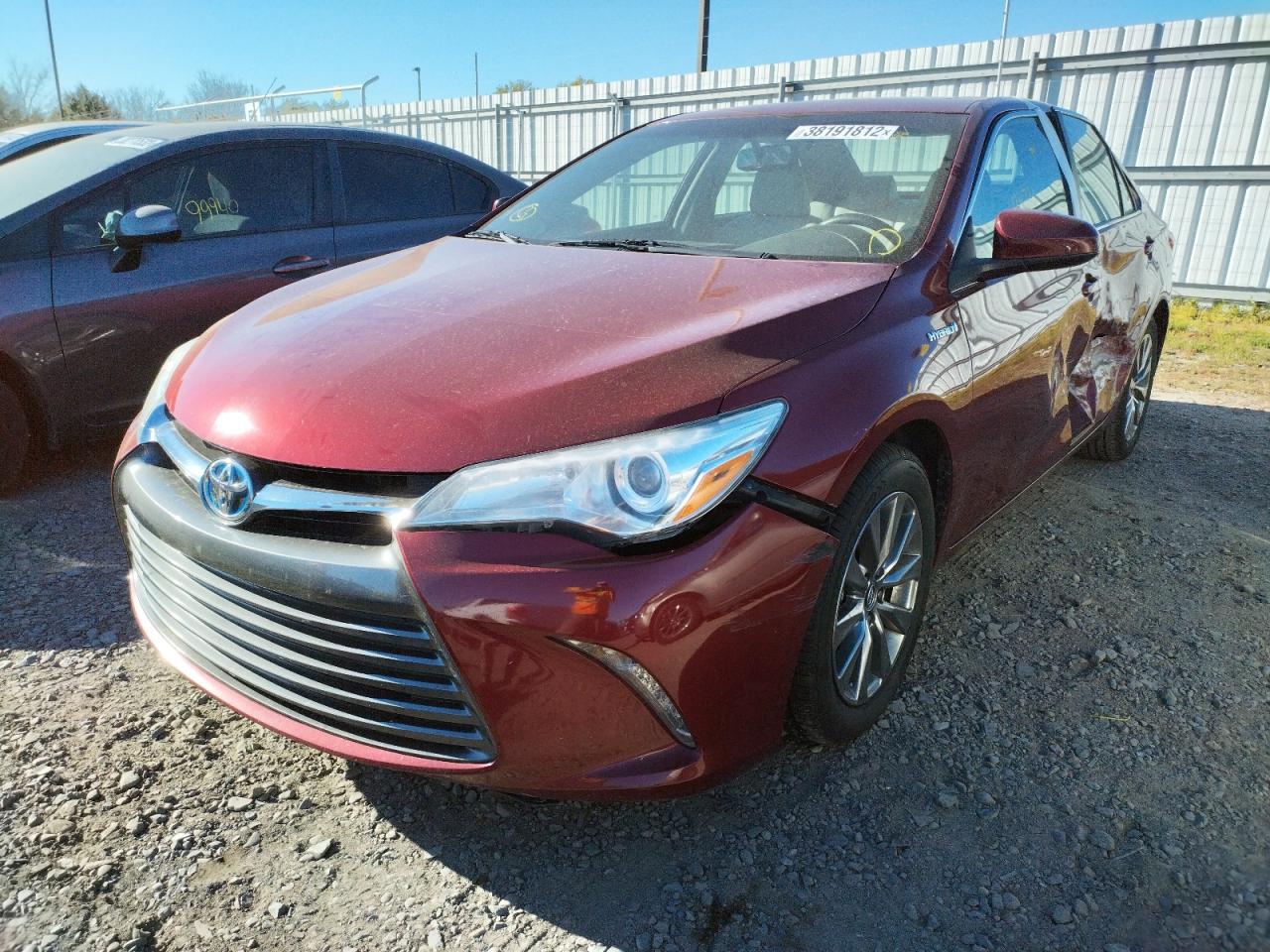 Photo 2 from auction – 2016 TOYOTA CAMRY HYBR with VIN 4T1BD1FK3GU181802