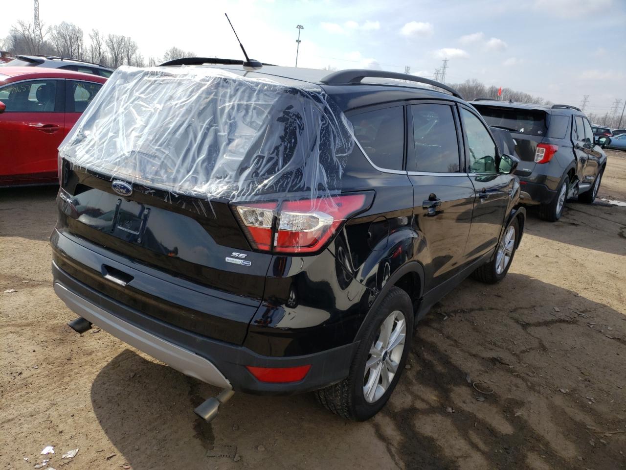 صورة رقم 4 من المزاد - 2018 FORD ESCAPE SE مع VIN 1FMCU9GD8JUC85583