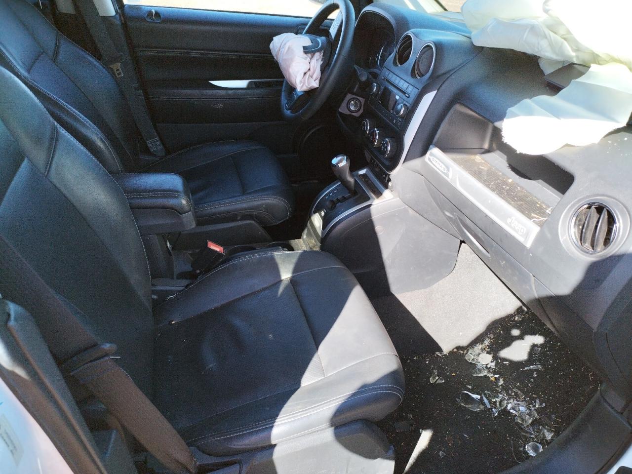 Photo 5 from auction – 2014 JEEP COMPASS LA with VIN 1C4NJCEAXED794317