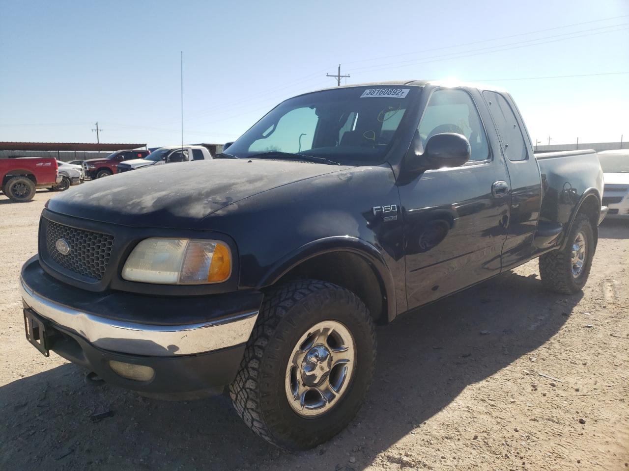 Photo 2 from auction – 1999 FORD F150 with VIN 1FTRX08L2XKC21986