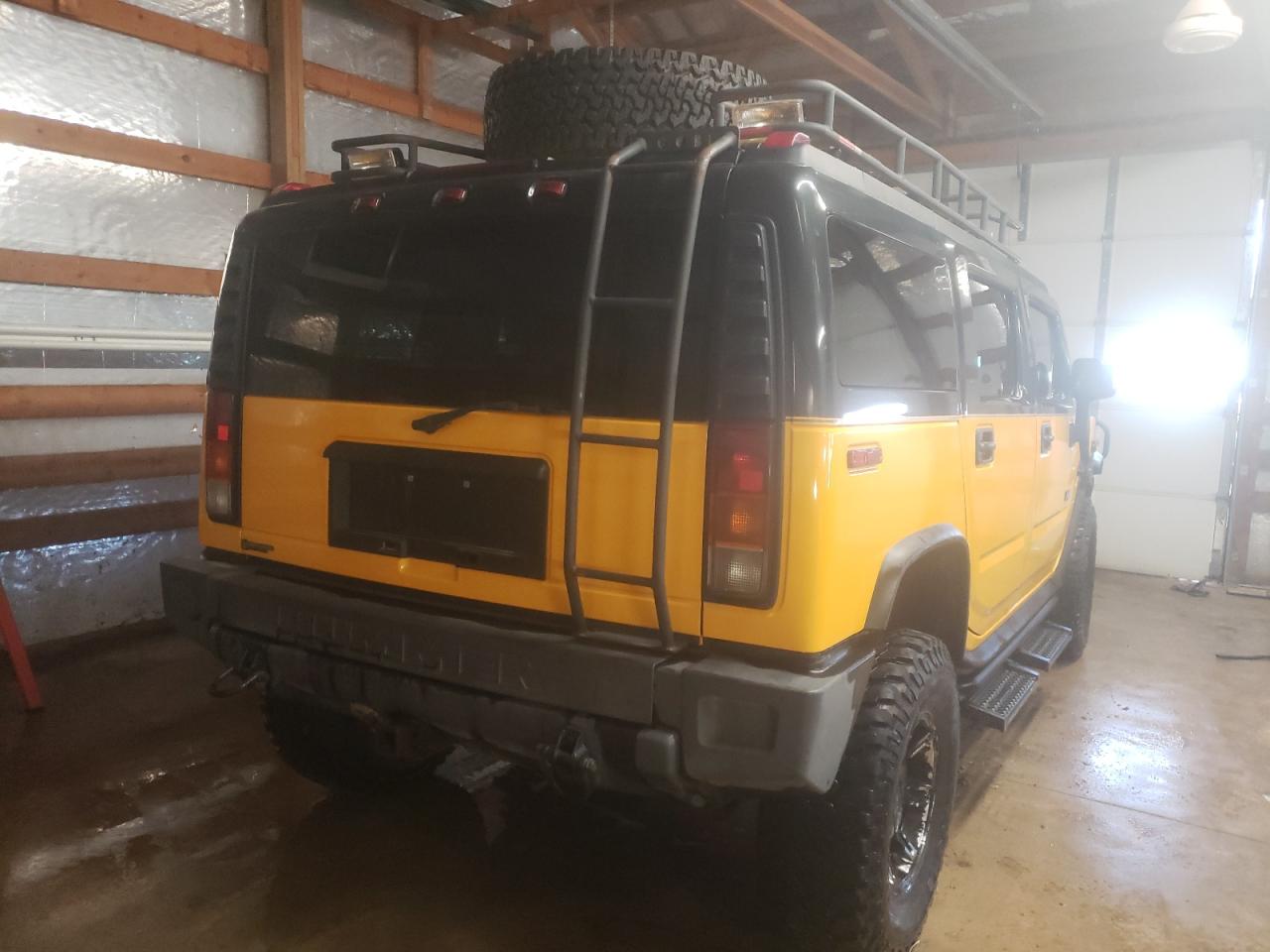 Photo 4 from auction – 2003 HUMMER H2 with VIN 5GRGN23U13H126009