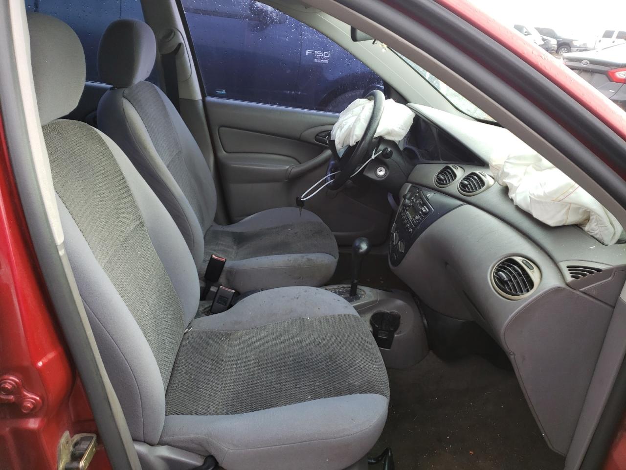 Photo 5 from auction – 2004 FORD FOCUS LX with VIN 1FAFP33Z84W152022