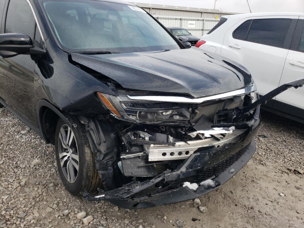 Photo 9 from auction – 2018 HONDA PILOT EXL with VIN 5FNYF6H52JB051152