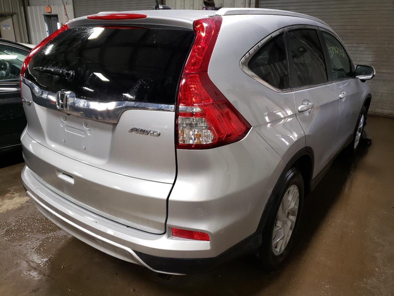 Photo 4 from auction – 2016 HONDA CR-V EXL with VIN 5J6RM4H72GL028521