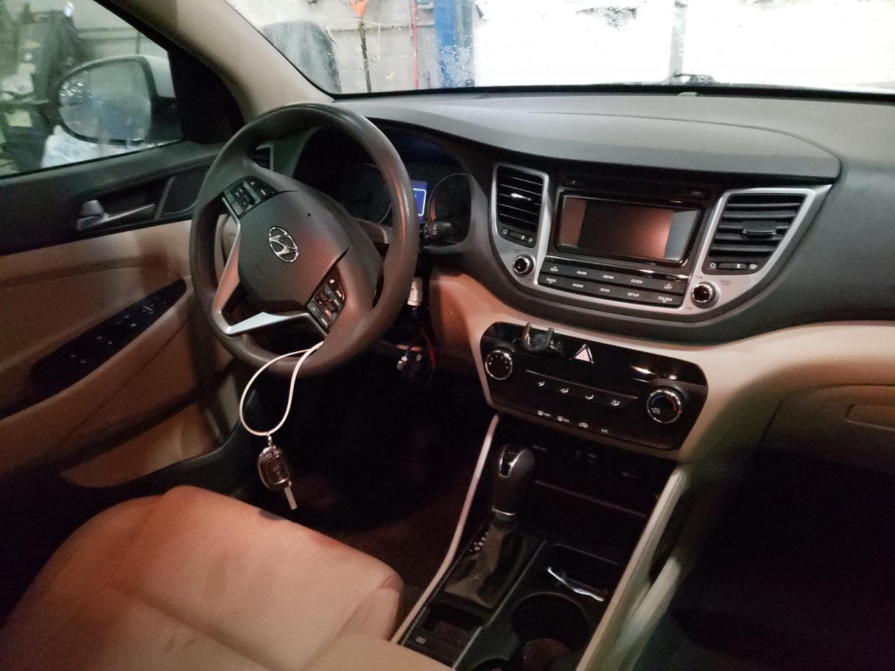 Photo 9 from auction – 2016 HYUNDAI TUCSON LIM with VIN KM8J33A43GU028517