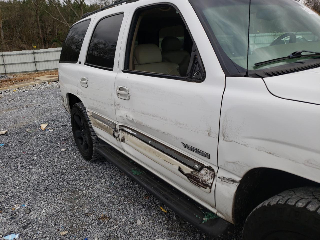 Photo 9 from auction – 2002 GMC YUKON with VIN 1GKEC13Z42R187078