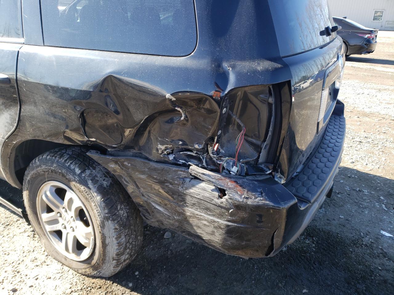 Photo 9 from auction – 2003 HONDA PILOT EX with VIN 2HKYF18483H605762