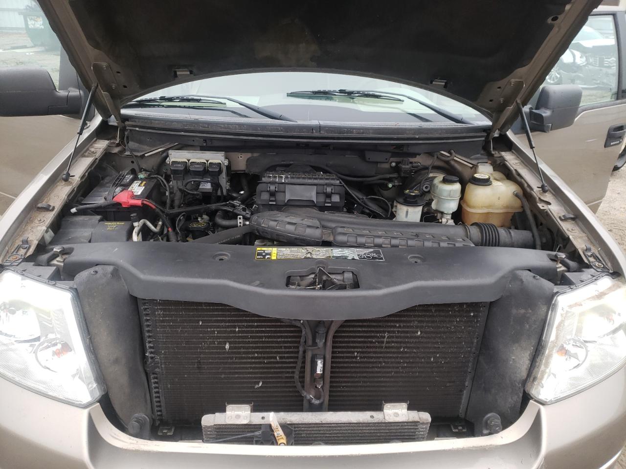 Photo 7 from auction – 2004 FORD F150 with VIN 1FTPX12544NB46970