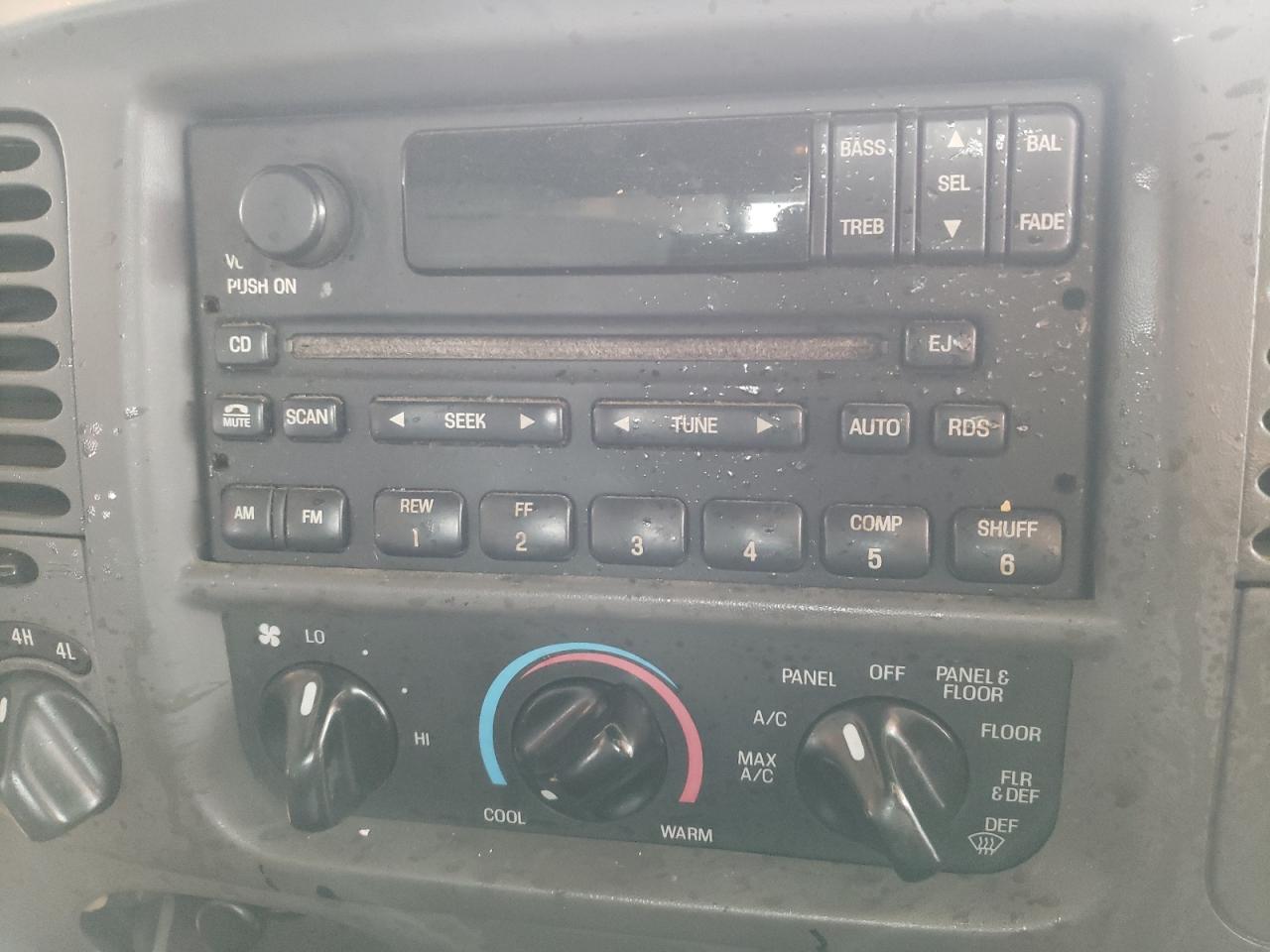 Photo 9 from auction – 2002 FORD F150 with VIN 1FTRX18LX2NA32516