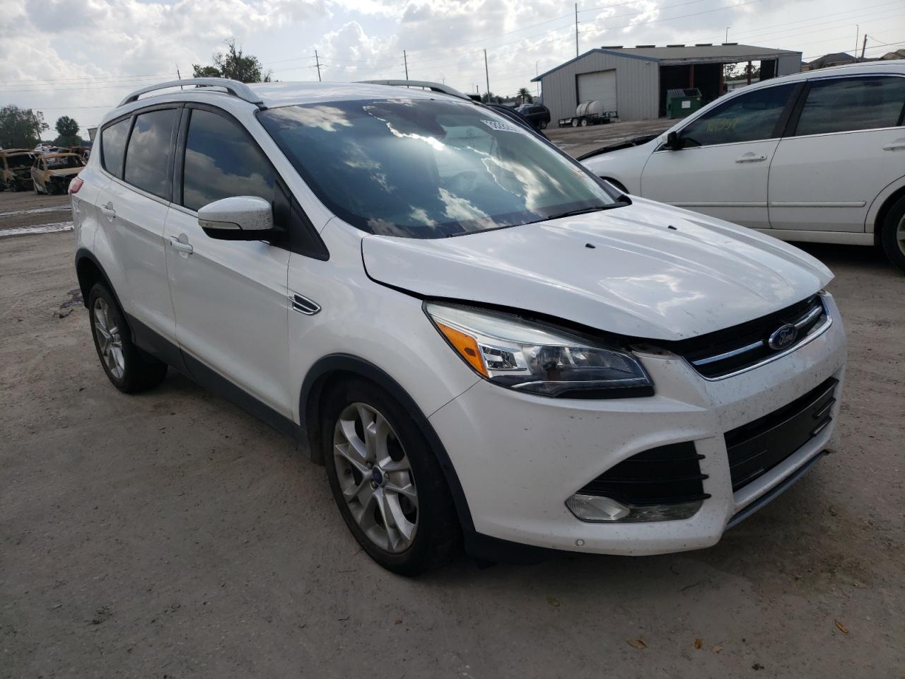 FORD ESCAPE TIT 2015 with VIN 1FMCU0JX6FUC23282 - Photo from auction