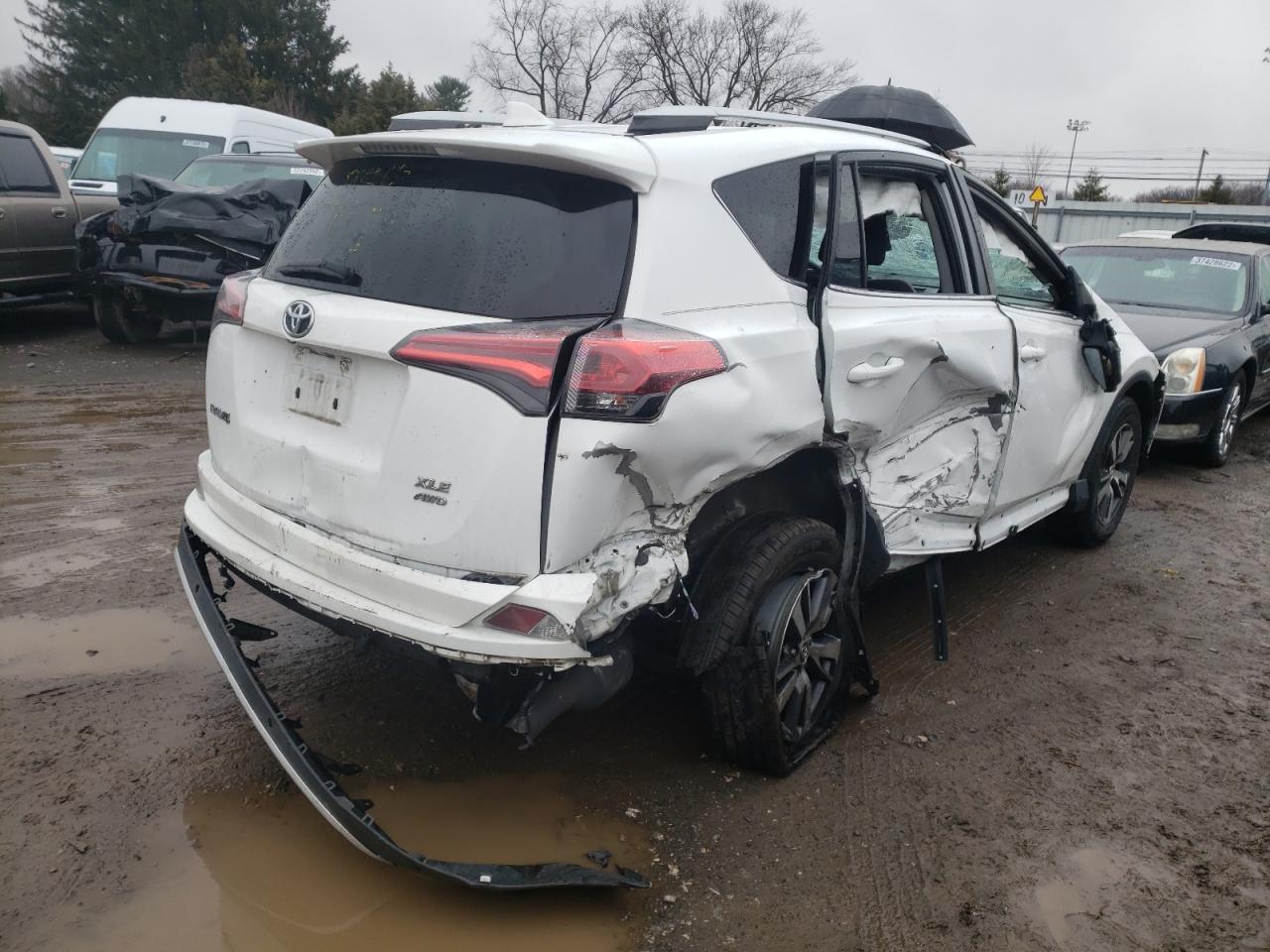Photo 4 from auction – 2016 TOYOTA RAV4 XLE with VIN 2T3RFREV7GW478095