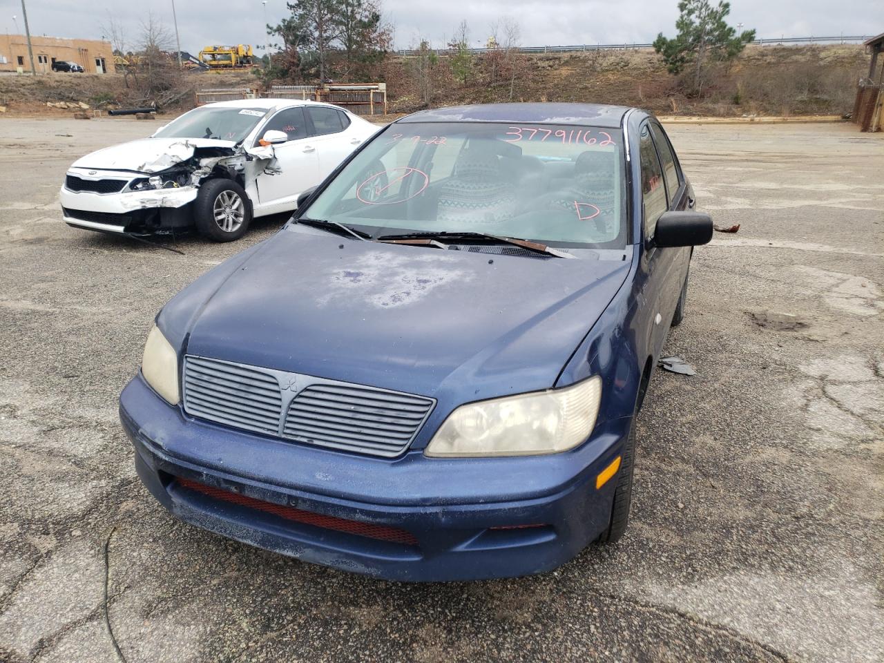 Photo 9 from auction – 2002 MITSUBISHI LANCER ES with VIN JA3AJ26E32U056539