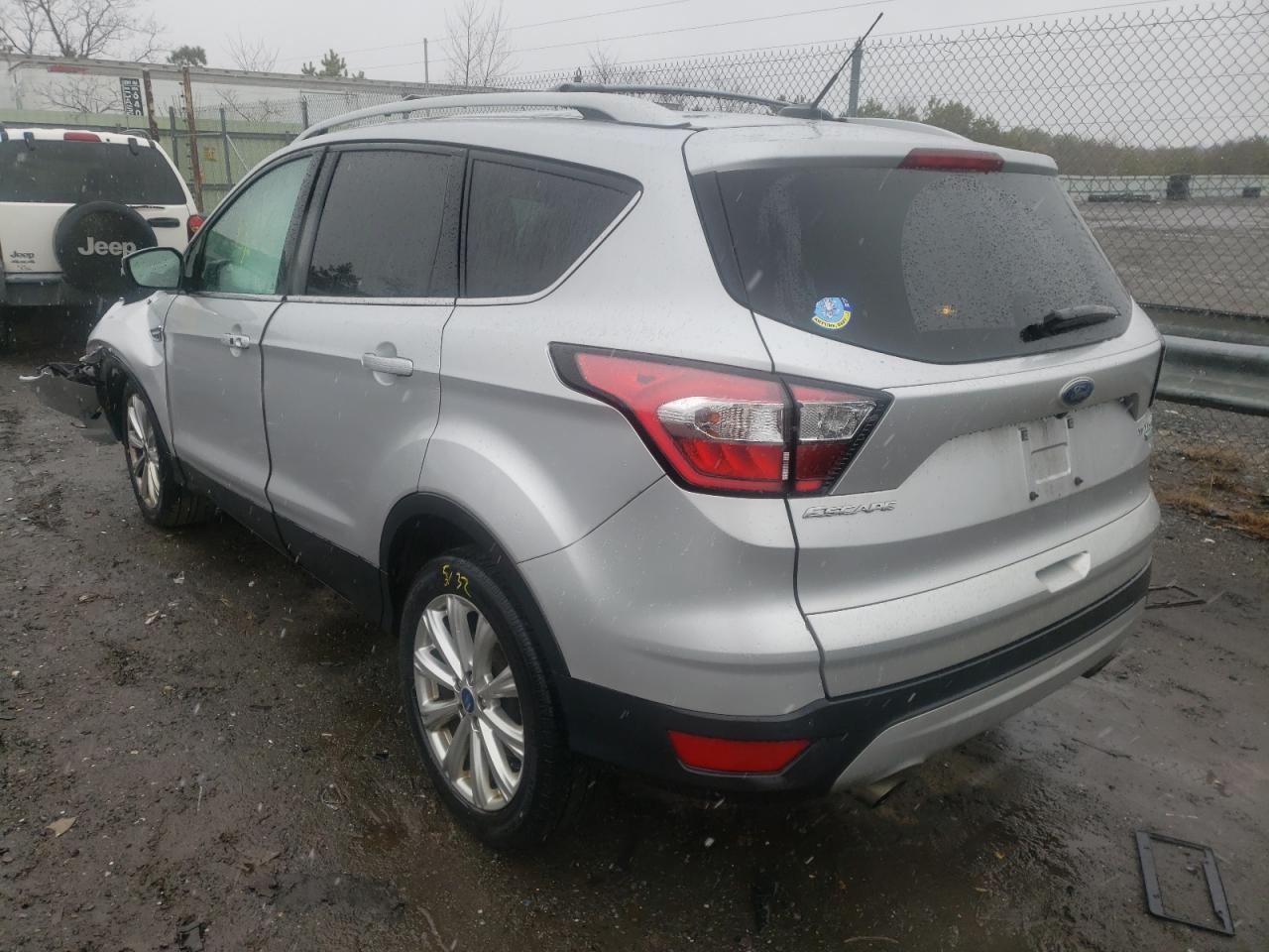 Photo 3 from auction – 2017 FORD ESCAPE TIT with VIN 1FMCU9J94HUD32901