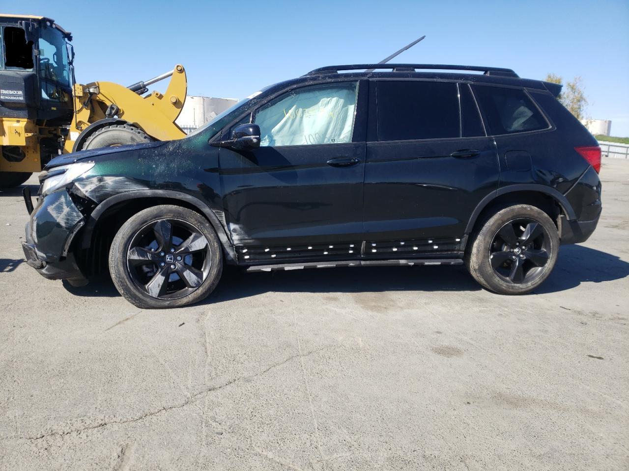 Photo 9 from auction – 2019 HONDA PASSPORT E with VIN 5FNYF8H09KB015220