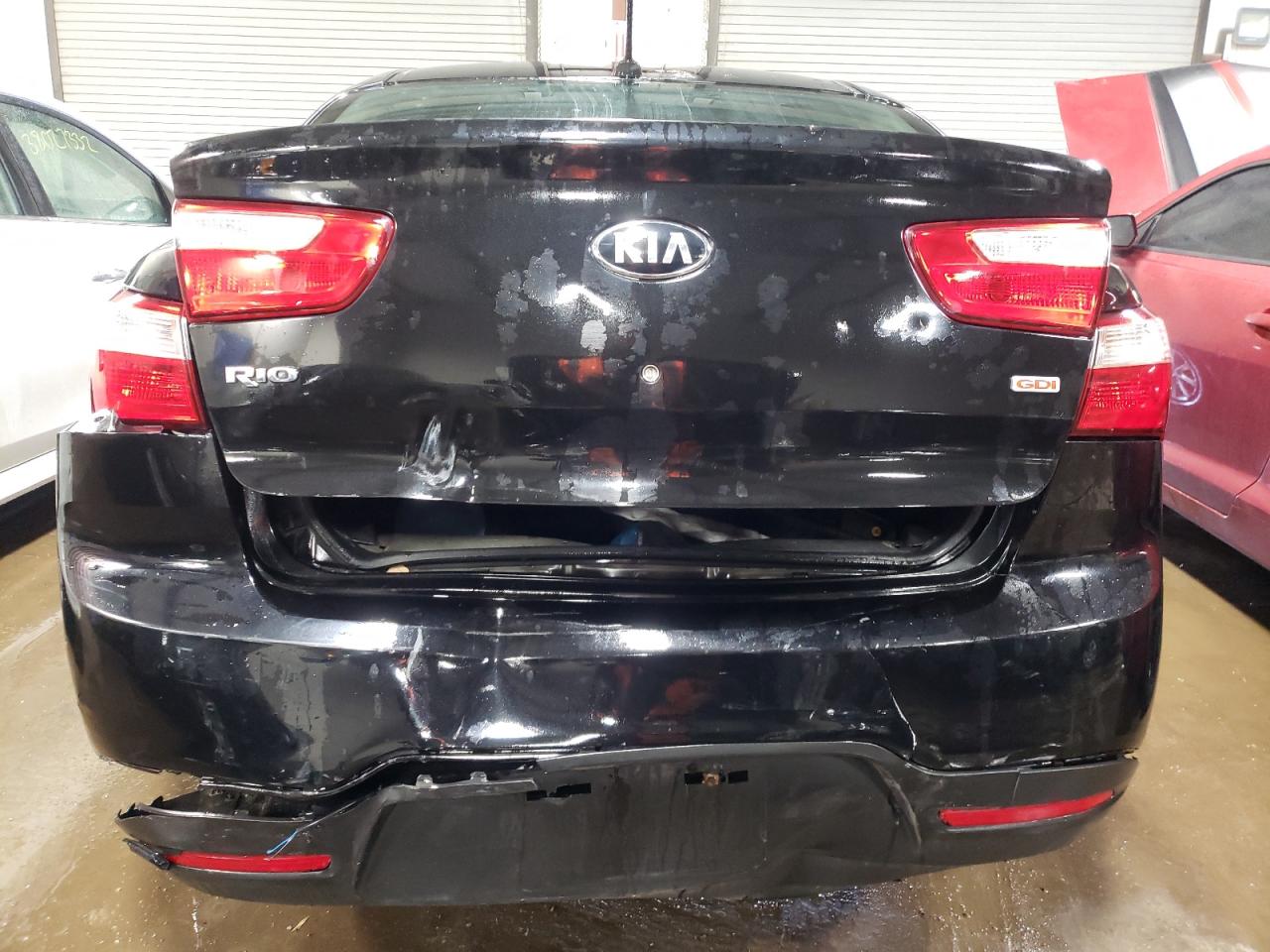 Photo 9 from auction – 2014 KIA RIO LX with VIN KNADM4A34E6417113