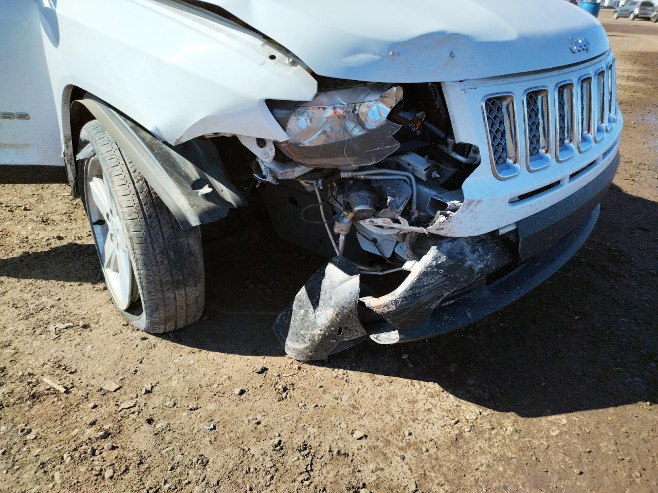 Photo 9 from auction – 2014 JEEP COMPASS LA with VIN 1C4NJCEAXED794317