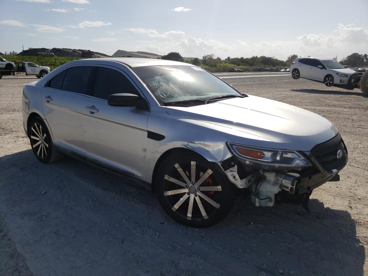 FORD TAURUS SE 2011 with VIN 1FAHP2DW3BG146529 - Photo from auction