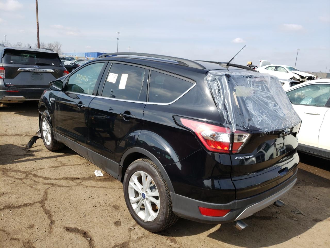 Photo 3 from auction – 2018 FORD ESCAPE SE with VIN 1FMCU9GD8JUC85583