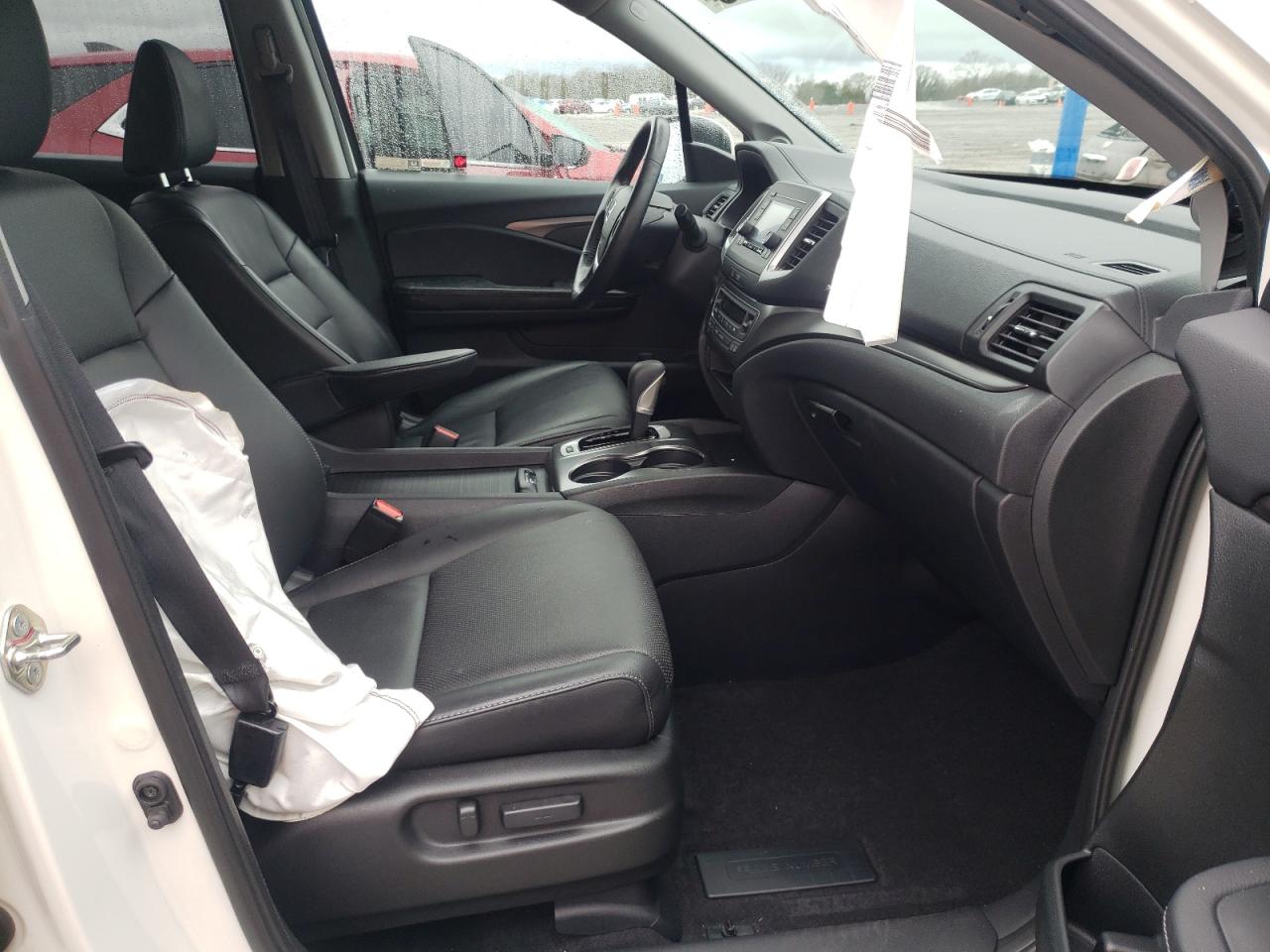Photo 5 from auction – 2018 HONDA RIDGELINE with VIN 5FPYK3F59JB014071
