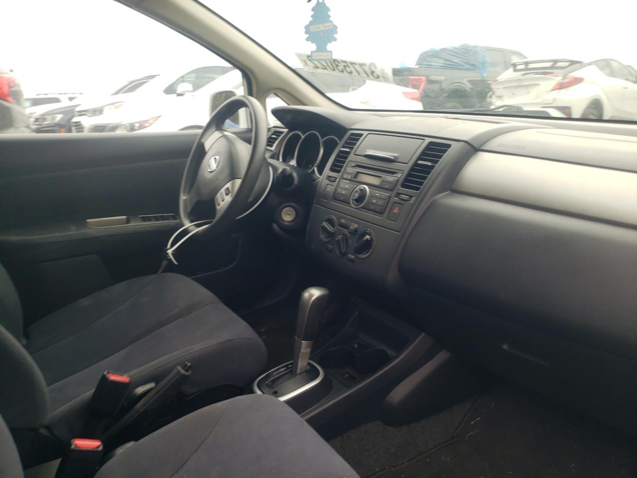 Photo 9 from auction – 2009 NISSAN VERSA S with VIN 3N1BC13EX9L482315