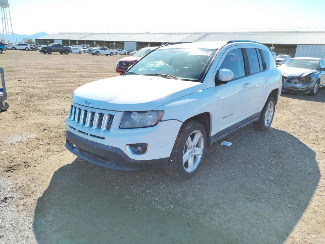 Photo 2 from auction – 2014 JEEP COMPASS LA with VIN 1C4NJCEAXED794317