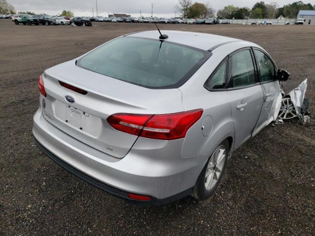 Photo 4 from auction – 2016 FORD FOCUS SE with VIN 1FADP3F29GL342617