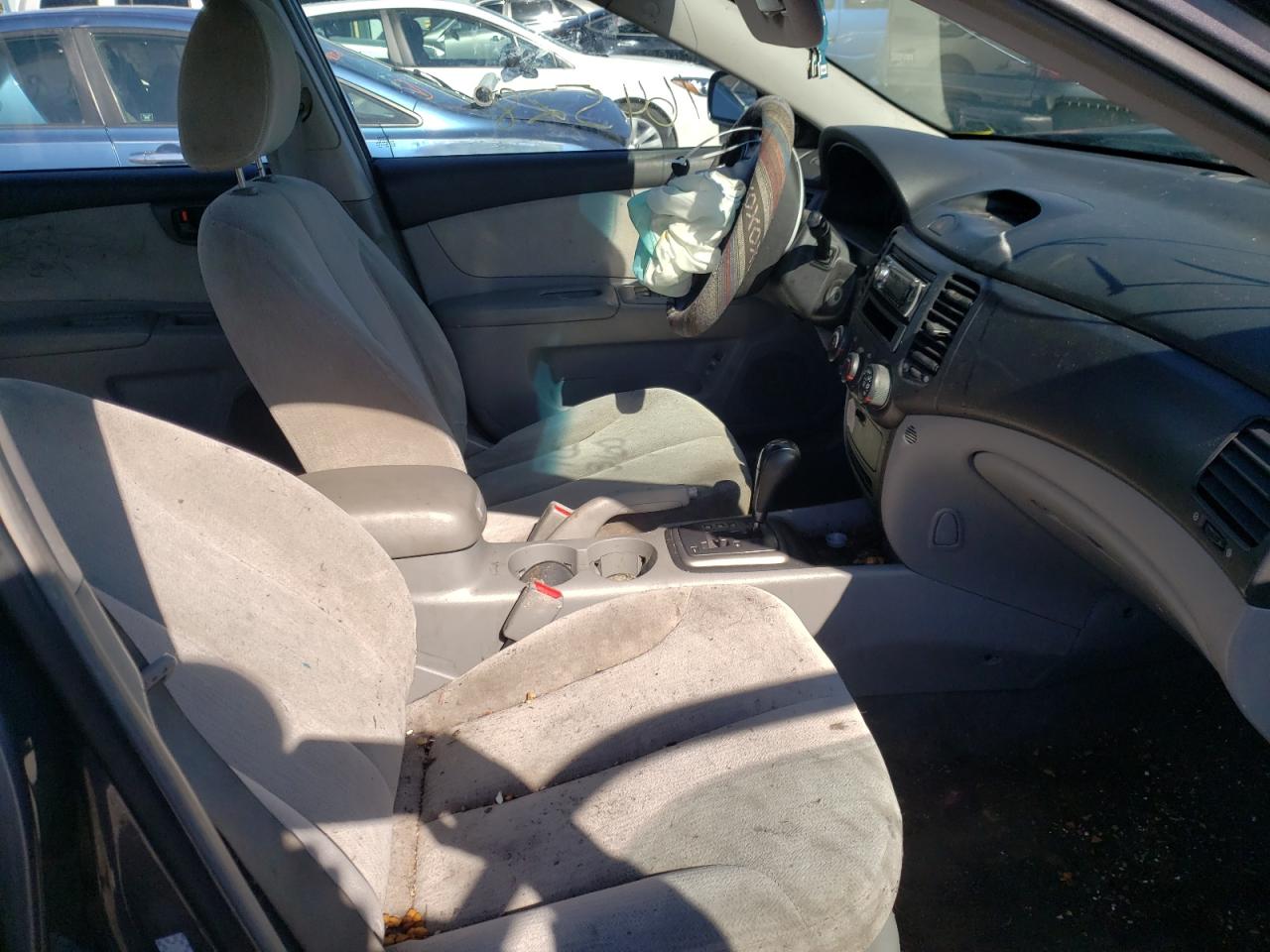 Photo 5 from auction – 2006 KIA OPTIMA LX with VIN KNAGE123765056460