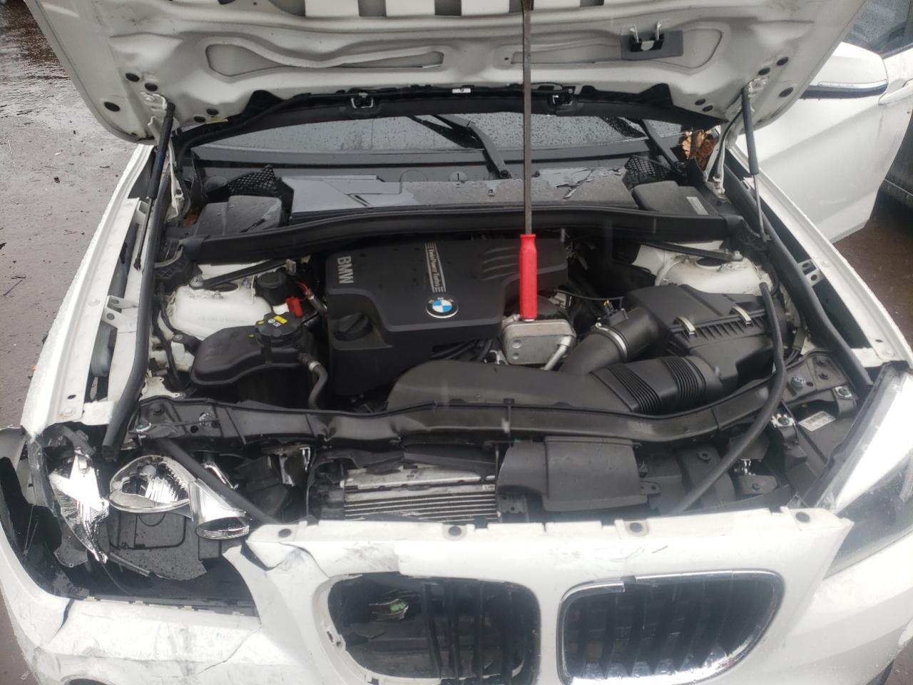 Photo 11 from auction – 2015 BMW X1 SDRIVE2 with VIN WBAVM1C59FV498635