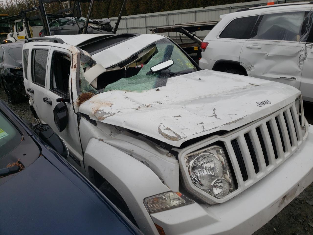 JEEP LIBERTY SP 2012 with VIN 1C4PJMAK0CW127738 - Photo from auction