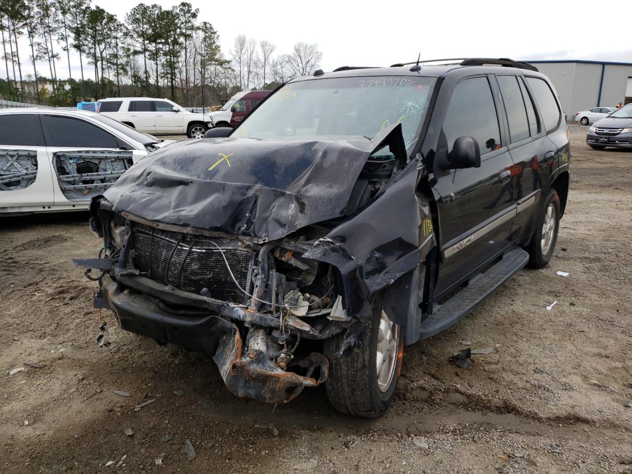 Photo 2 from auction – 2005 GMC ENVOY with VIN 1GKDS13S352259242