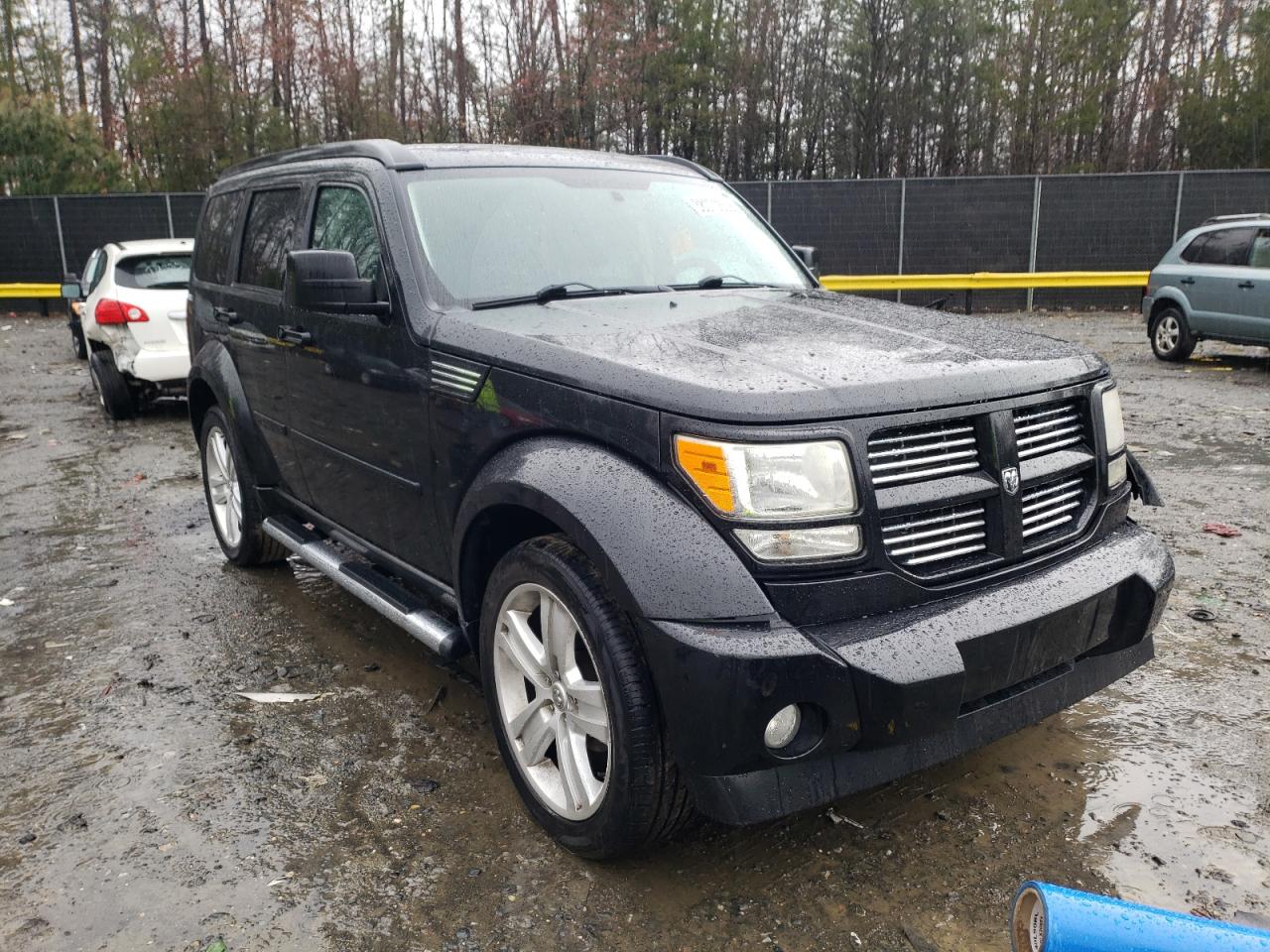 DODGE NITRO HEAT 2011 with VIN 1D4PU4GXXBW607054 - Photo from auction