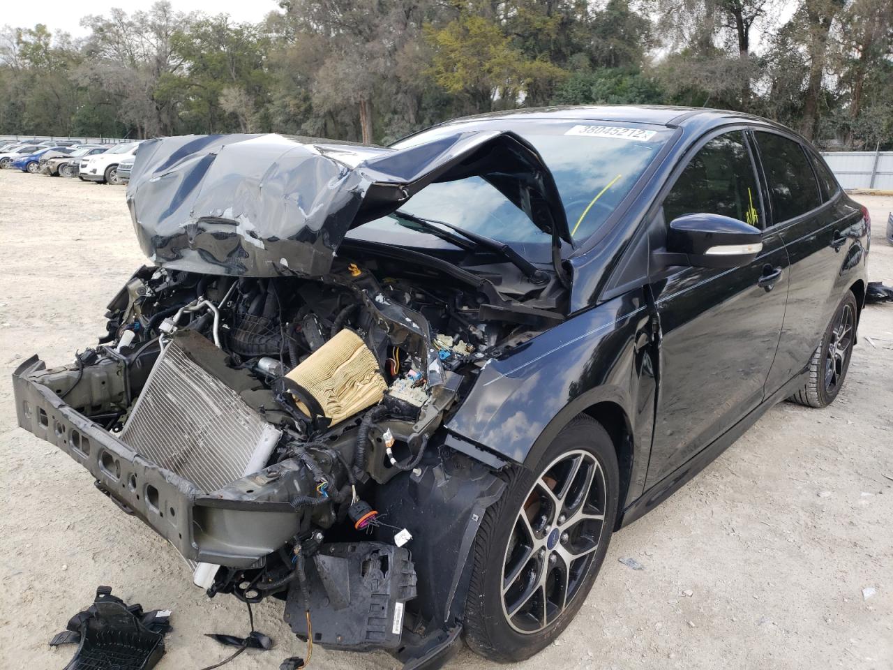 Photo 2 from auction – 2015 FORD FOCUS SE with VIN 1FADP3F25FL339101