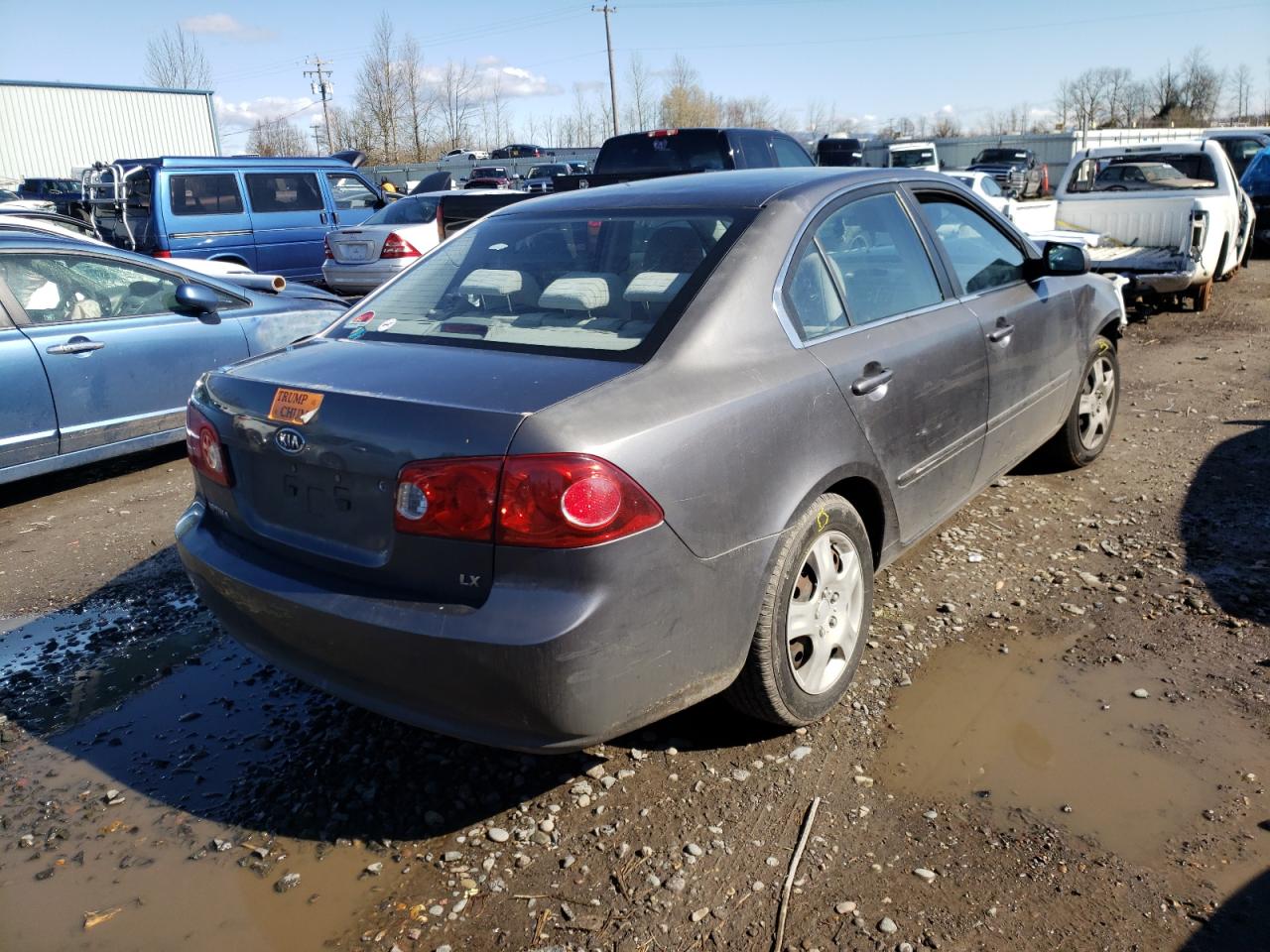 Photo 4 from auction – 2006 KIA OPTIMA LX with VIN KNAGE123765056460