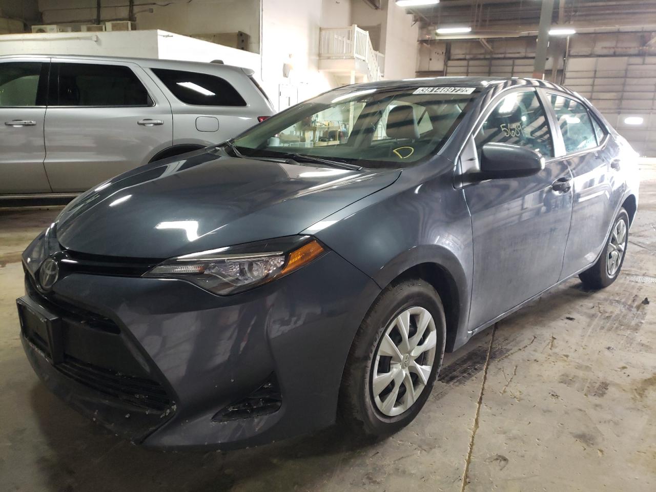 Photo 2 from auction – 2017 TOYOTA COROLLA L with VIN 5YFBURHE6HP587503