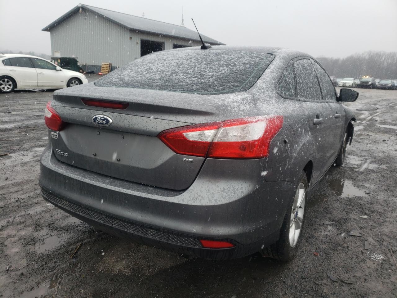 Foto 4 de la subasta – 2013 FORD FOCUS SE con VIN 1FADP3F21DL193390