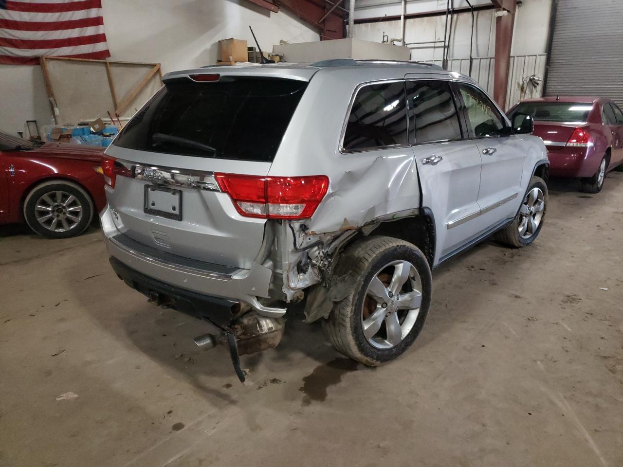 Photo 4 from auction – 2011 JEEP GRAND CHER with VIN 1J4RR6GT9BC586449