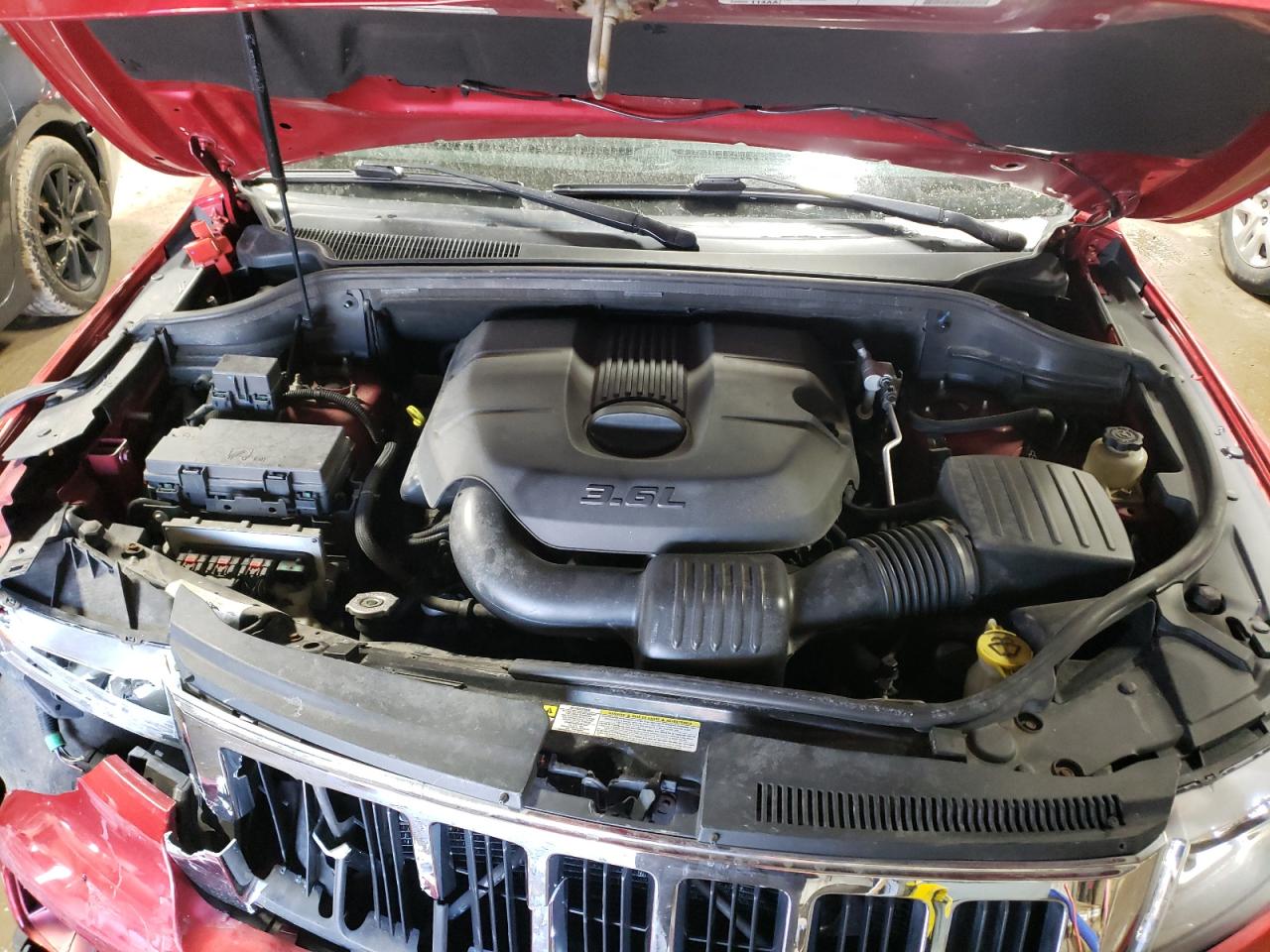 Photo 7 from auction – 2011 JEEP GRAND CHER with VIN 1J4RR4GGXBC527823
