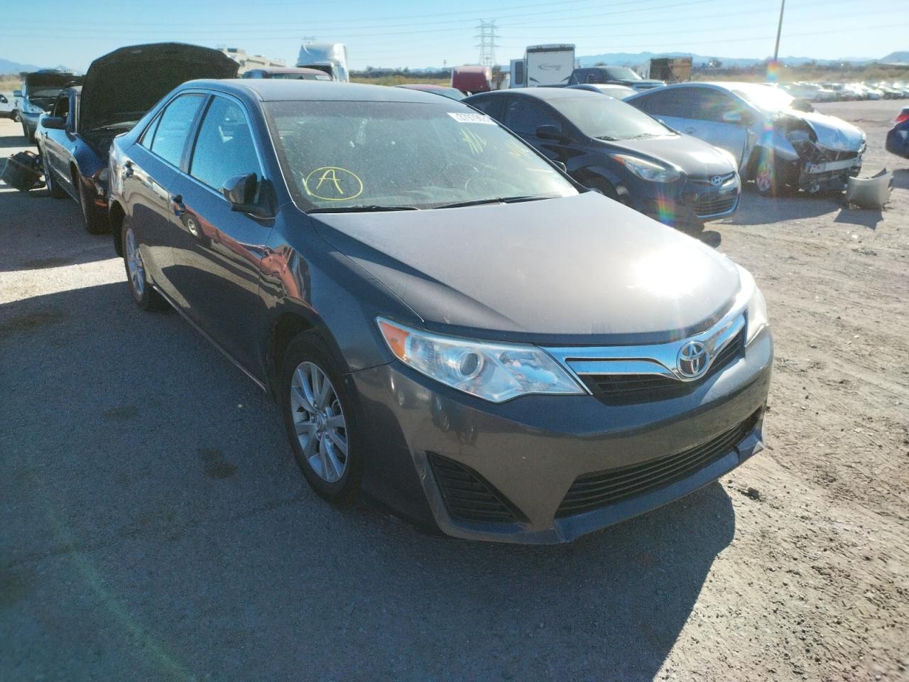 TOYOTA CAMRY 2014 with VIN 4T4BF1FKXER352588 - Photo from auction