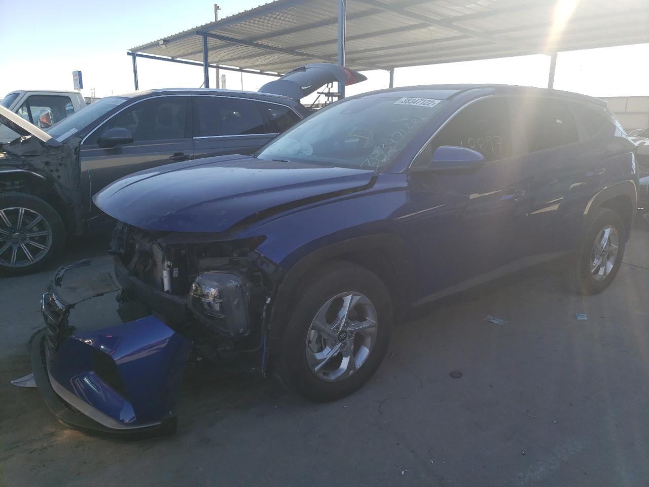 Photo 2 from auction – 2022 HYUNDAI TUCSON SE with VIN 5NMJACAE4NH015931